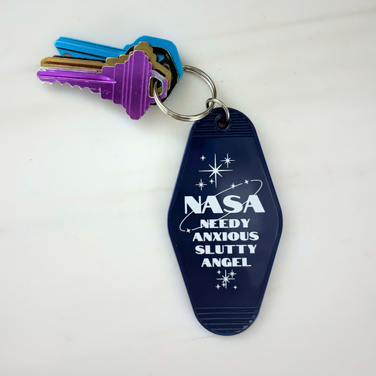 Needy Anxious Slutty Angel Space Explorer Motel Style Keychain in Dark Blue-GetBullish-The Bullish Store
