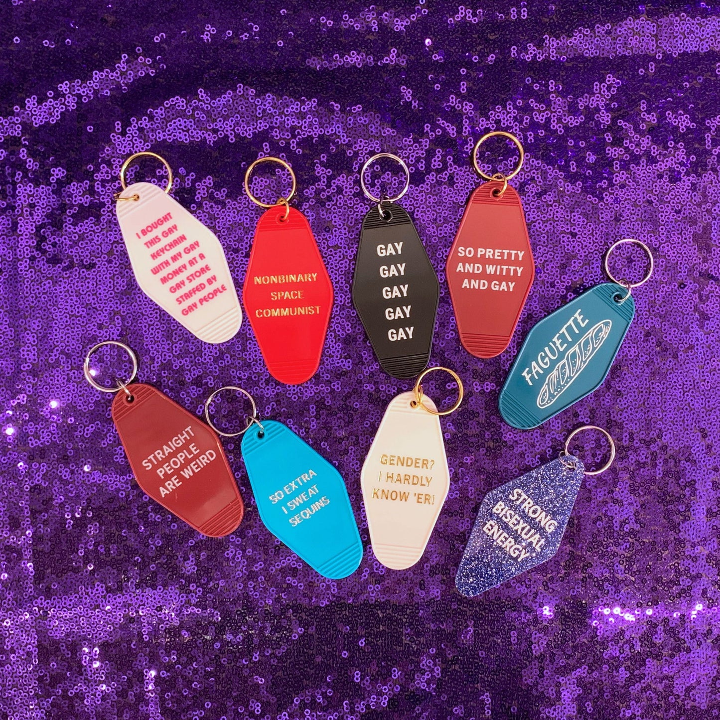Nonbinary Space Communist Motel Style Keychain in Red and Gold