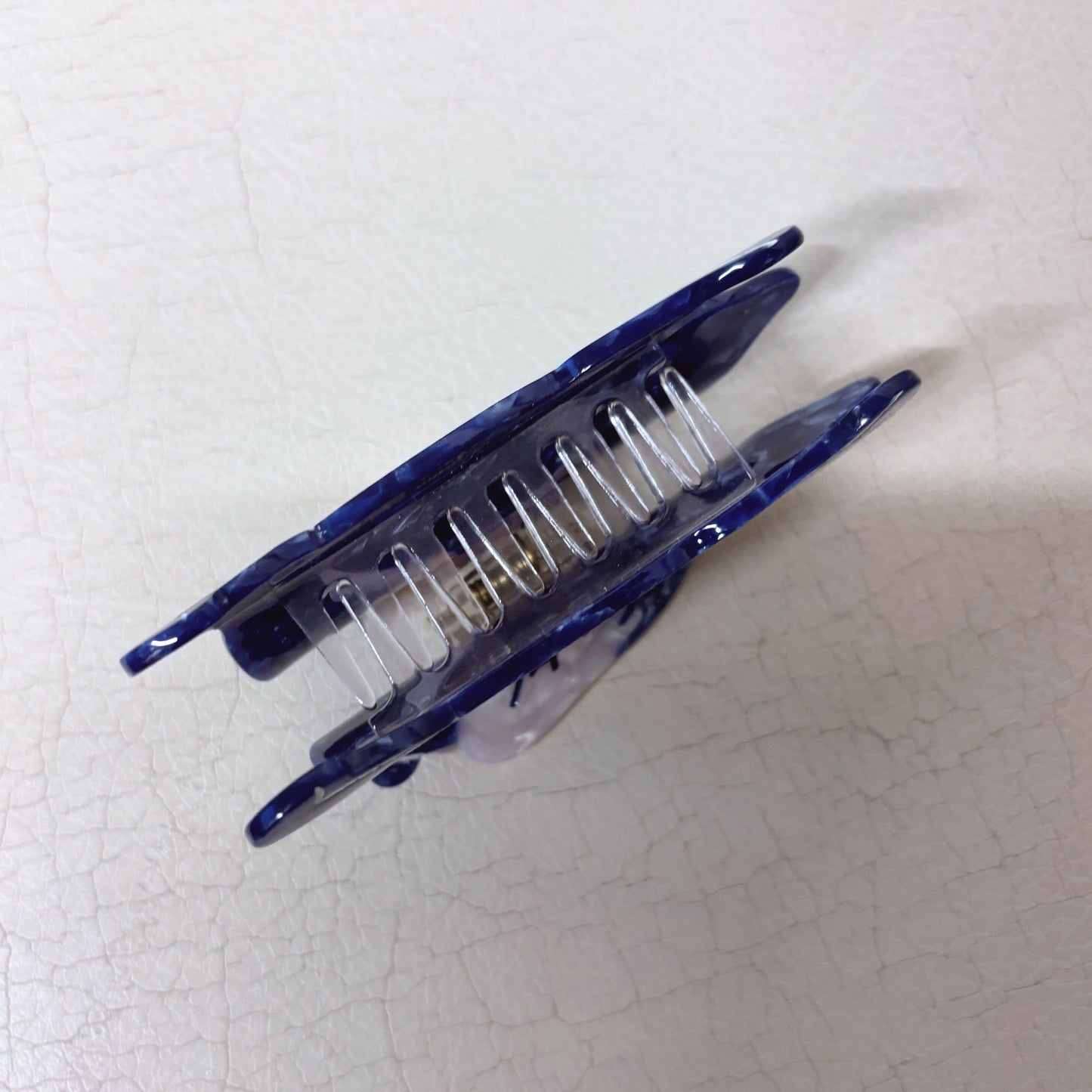 Nude Woman Riding a Bear Hair Claw in Marbled Blue