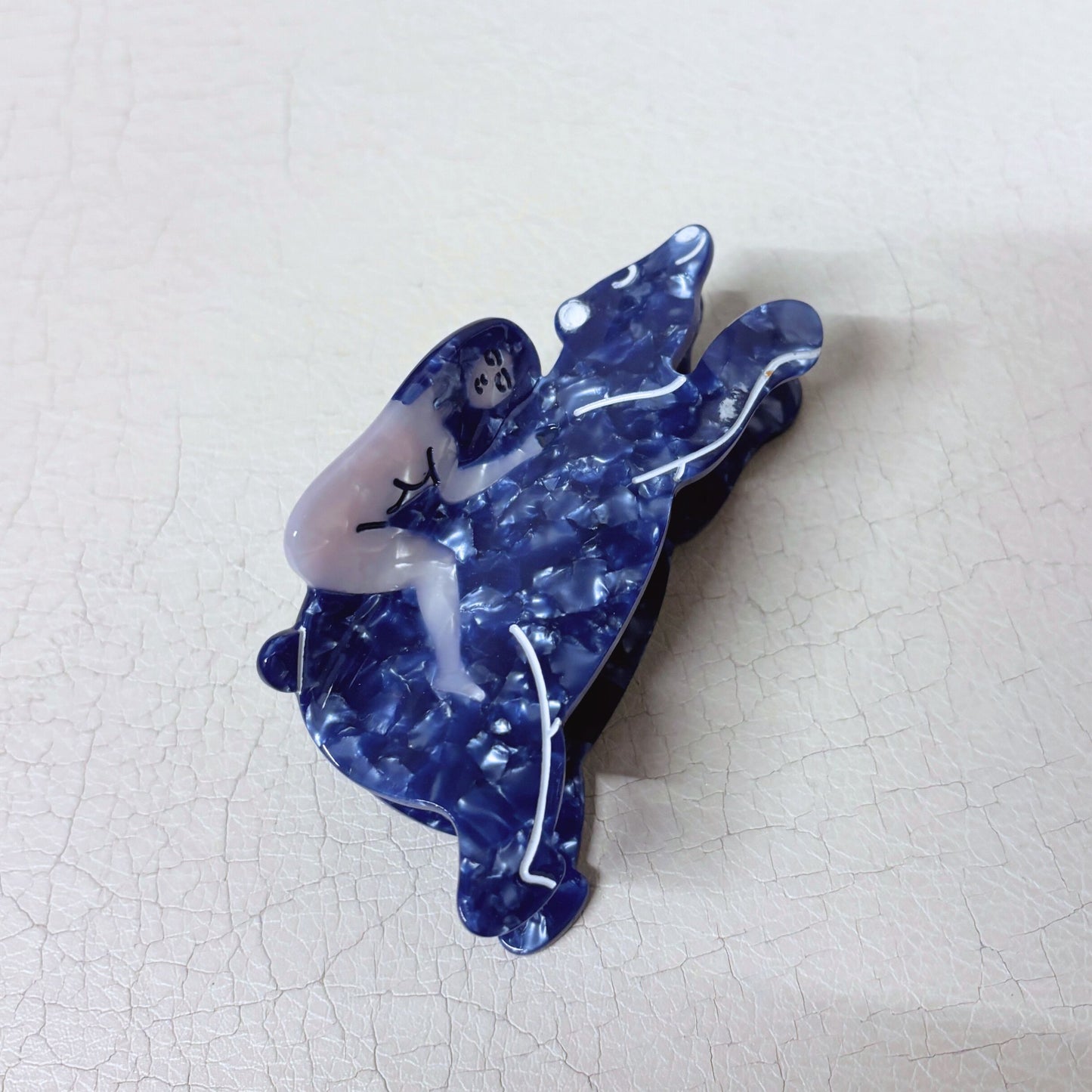 Nude Woman Riding a Bear Hair Claw in Marbled Blue | Claw Clip in Velvet Travel Bag
