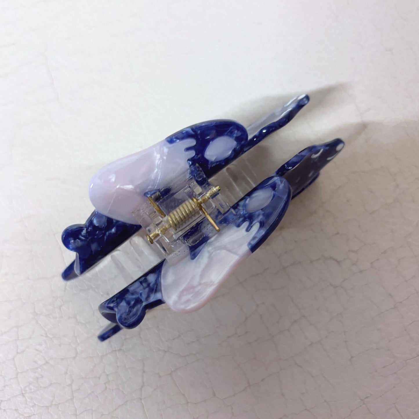 Nude Woman Riding a Bear Hair Claw in Marbled Blue | Claw Clip in Velvet Travel Bag