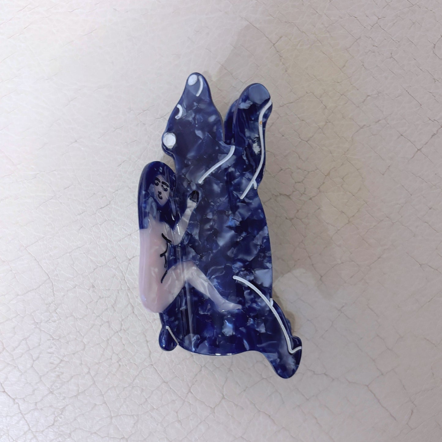 Nude Woman Riding a Bear Hair Claw in Marbled Blue | Claw Clip in Velvet Travel Bag