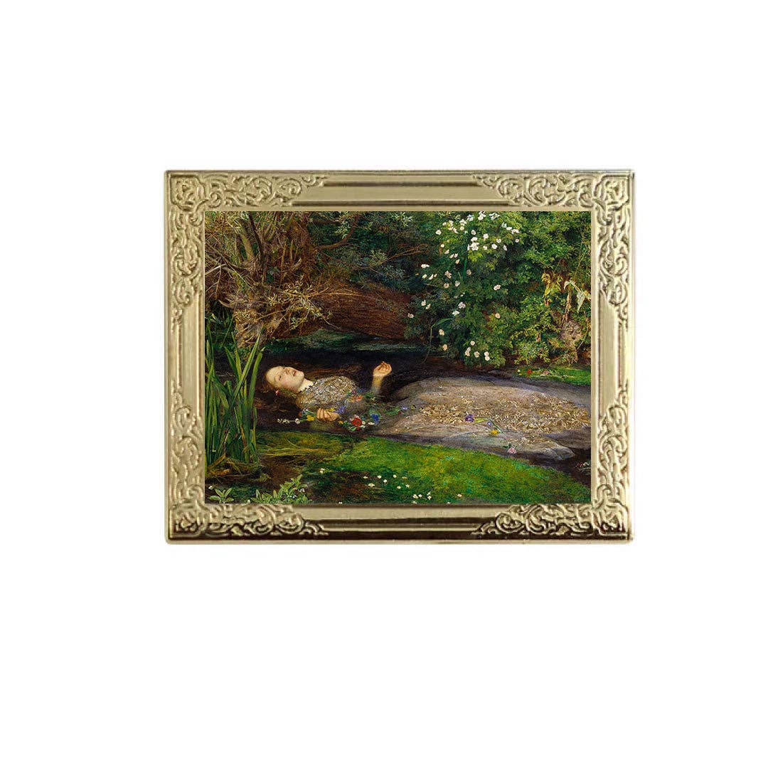 Lapel pin of a framed painting of a natural landscape with a stream and trees.