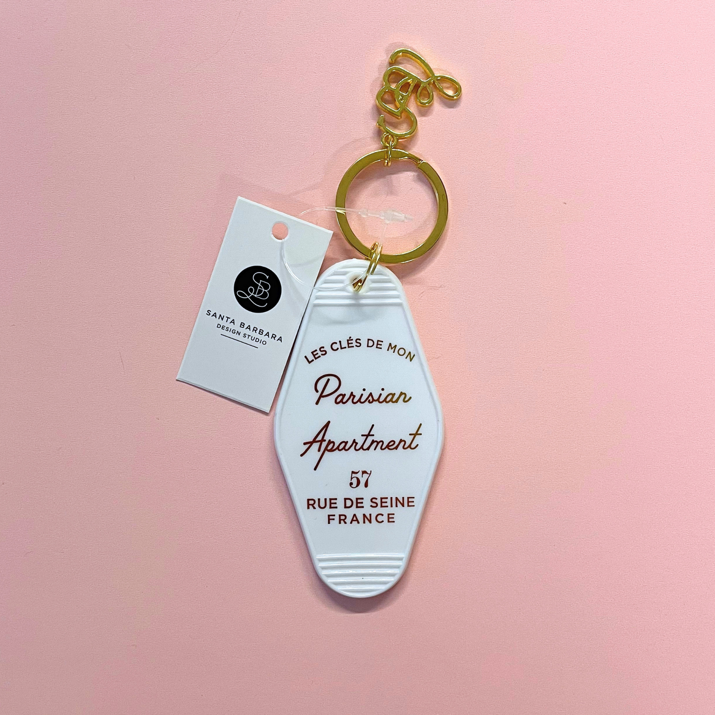 Parisian Apartment Motel Keychain in White