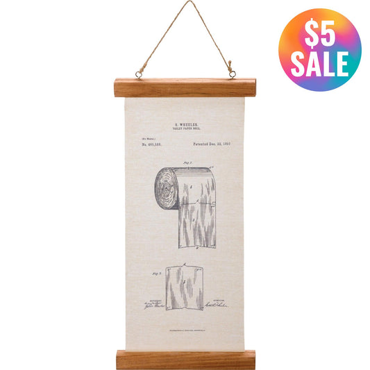 Wall hanging with a wooden frame displaying a toilet paper roll patent illustration on a white background