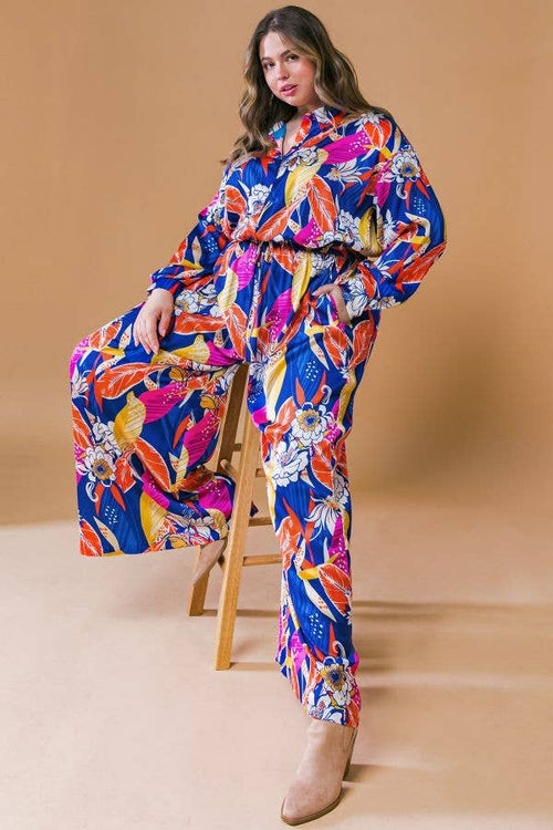 Plus Size Printed Woven Jumpsuit in Blue with Flowers And Leaf Designs | Long Sleeve Romper [Sizes 1X-3X]