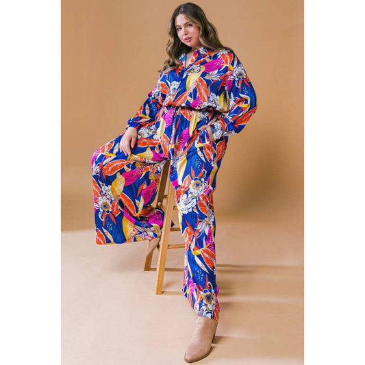 Plus Size Printed Woven Jumpsuit in Blue with Flowers And Leaf Designs | Long Sleeve Romper [Sizes 1X-3X]