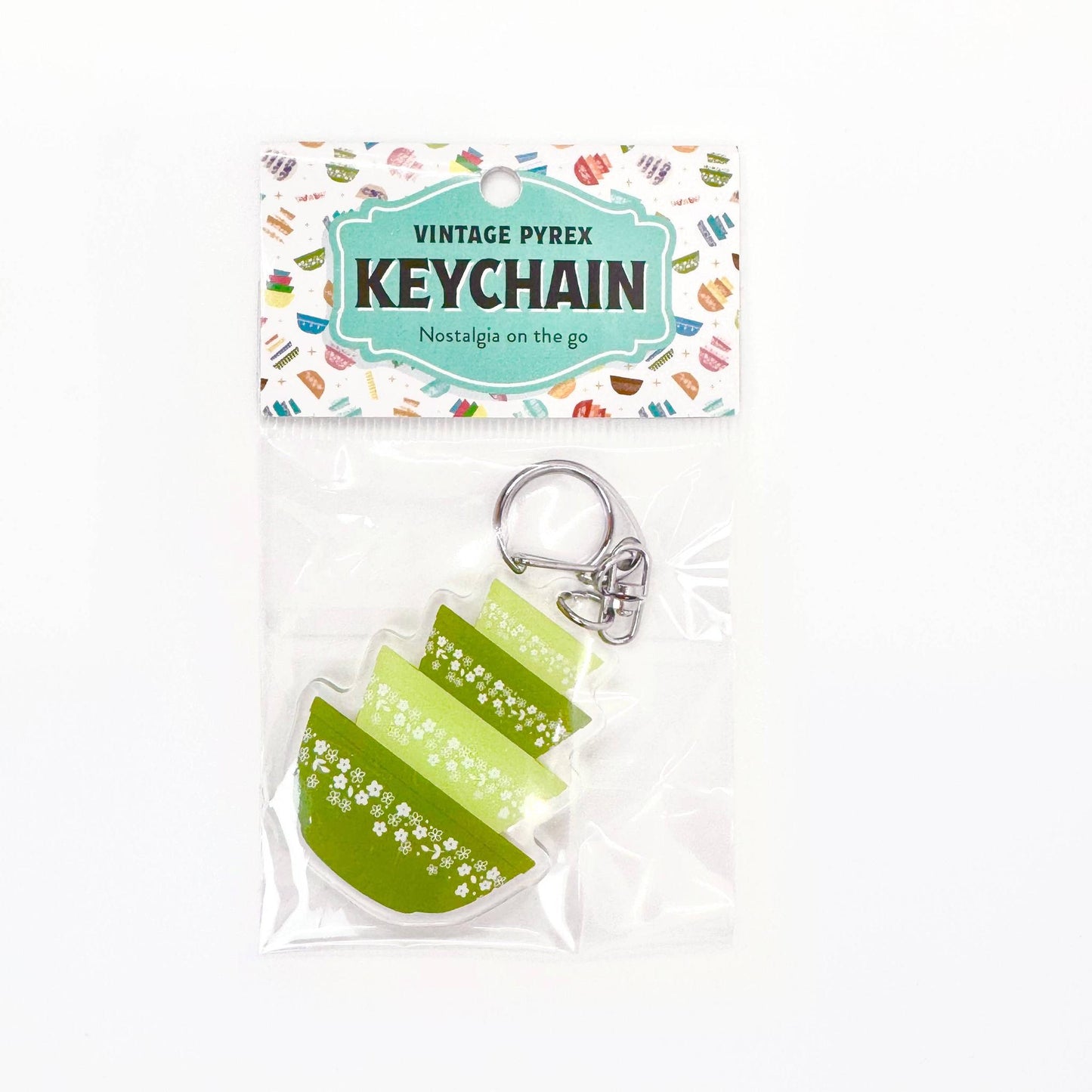 Keychain with vintage Pyrex design packaging on a white background