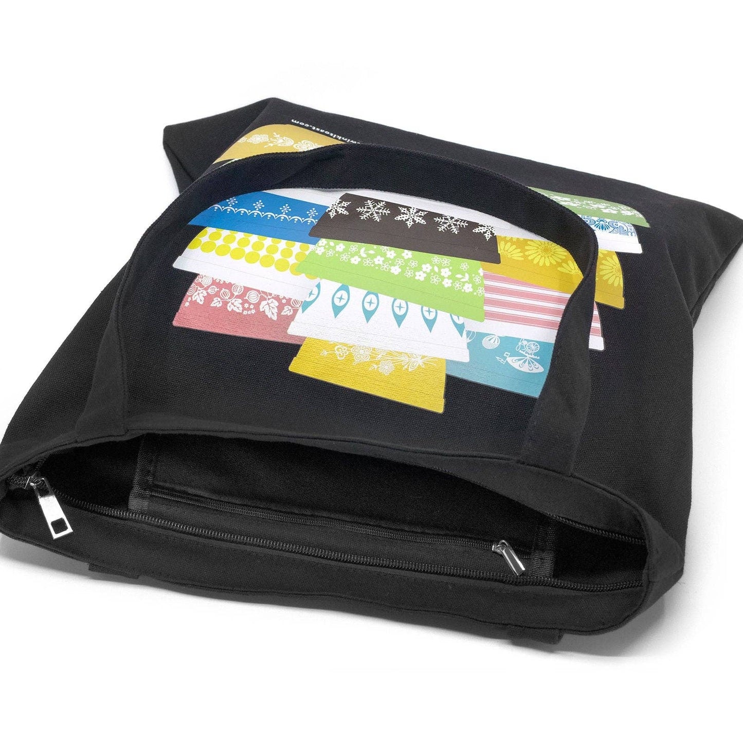 Black tote bag with colorful bowls design on a white background