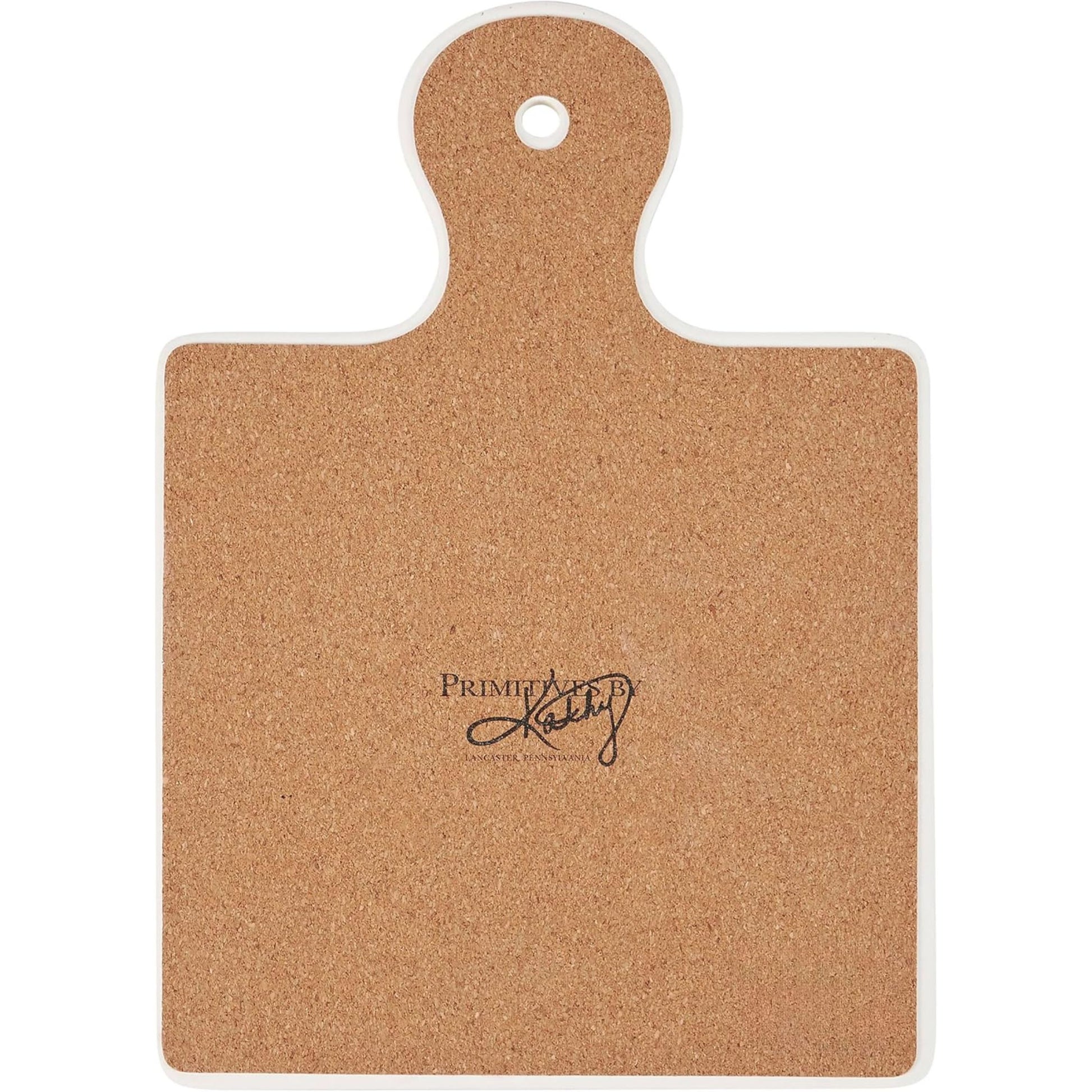 Back part of trivet with a handle and 'Primitives by Kathy' logo