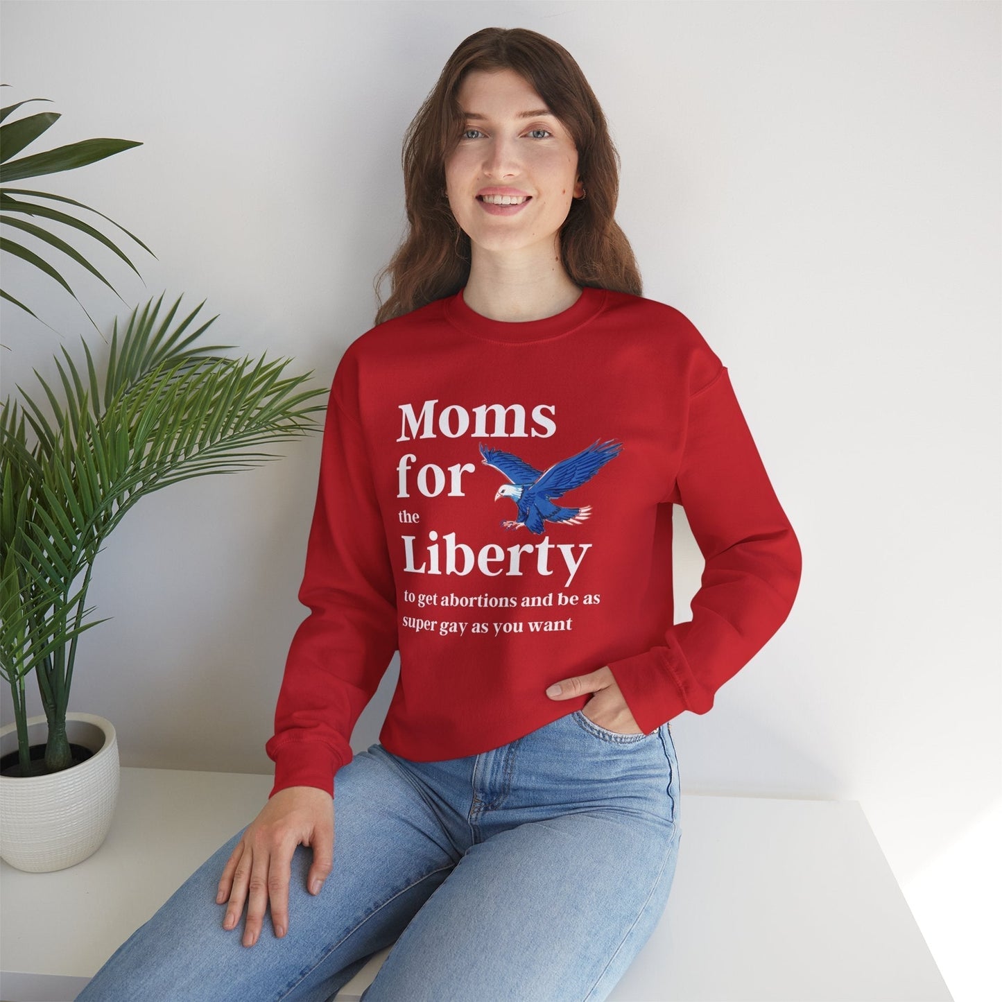 [SATIRE] Moms for (the) Liberty (to get abortions and be as super gay as you want) Unisex Heavy Blend™ Crewneck Sweatshirt Sizes SM-5XL | Plus Size Available