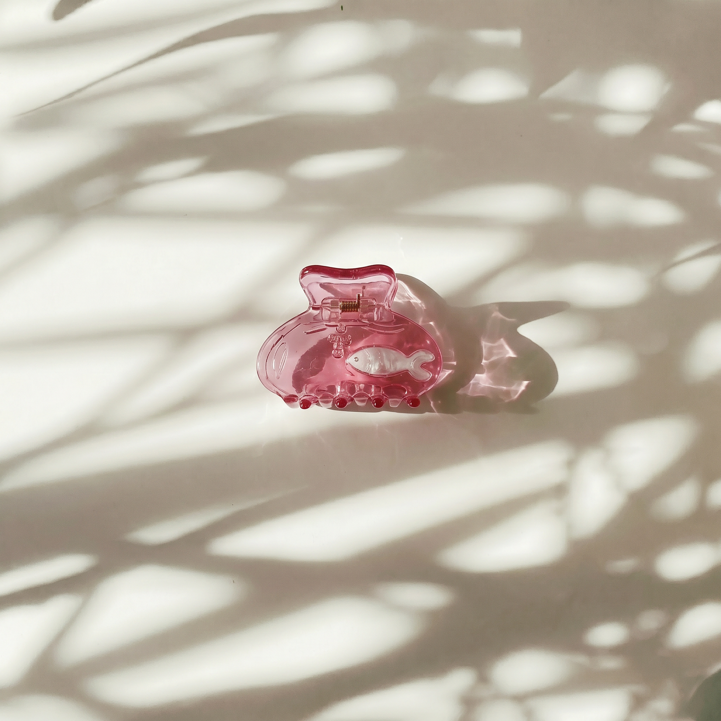 School of One Mini Fish Hair Claw in Translucent Pink
