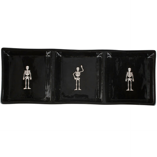 Black tray with white skeleton figures on a white background