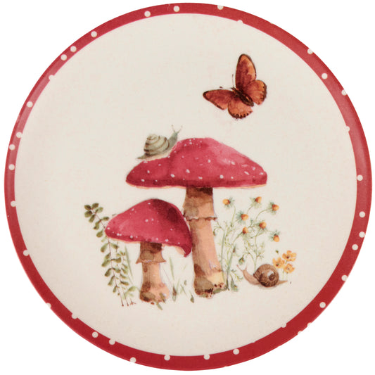 Round plate with red mushrooms, a butterfly, and snails on a white background