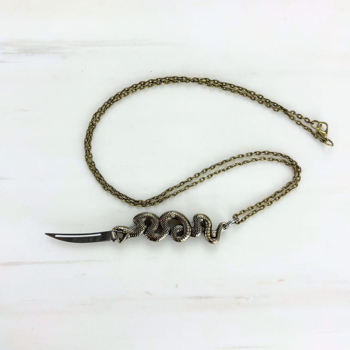 Snake Knife Necklace in Bronze | Folding Knife Pendant | GetBullish