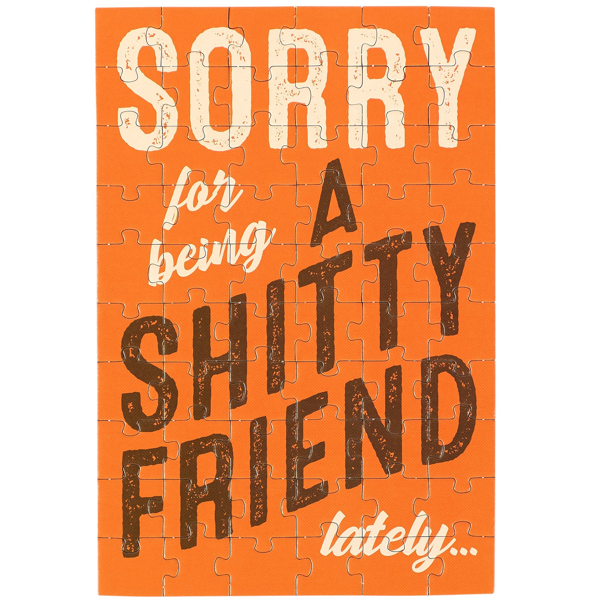Puzzle with text 'Sorry for being a shitty friend lately' on an orange background