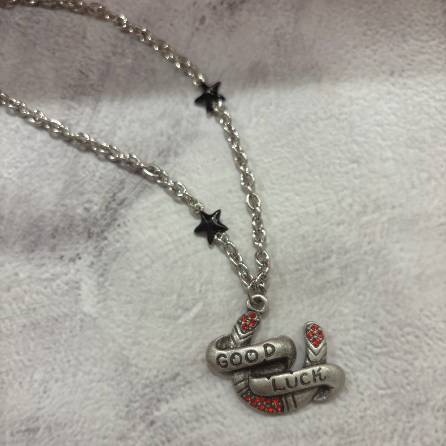 Sourpuss "Good Luck” Horseshoe Necklace with Red Rhinestones & Black Star Charms