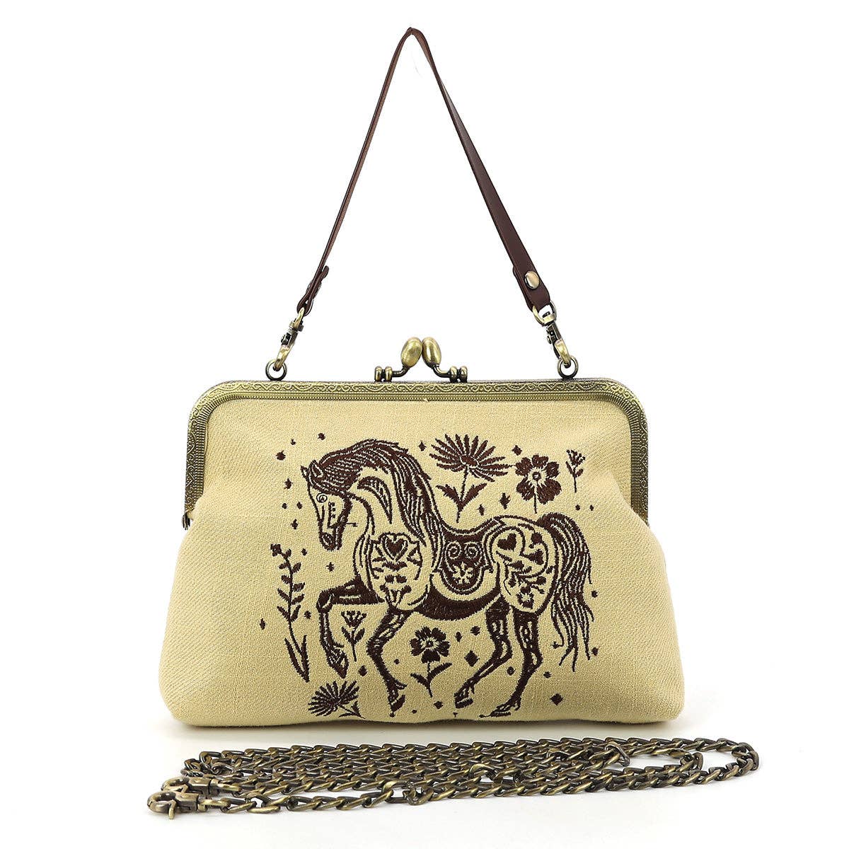 A handbag in a light beige color with a dark brown printed illustration of a horse and floral motifs. It features a dark brown shoulder strap, a metal kiss-lock clasp, and a long antique bronze chain strap resting in front.