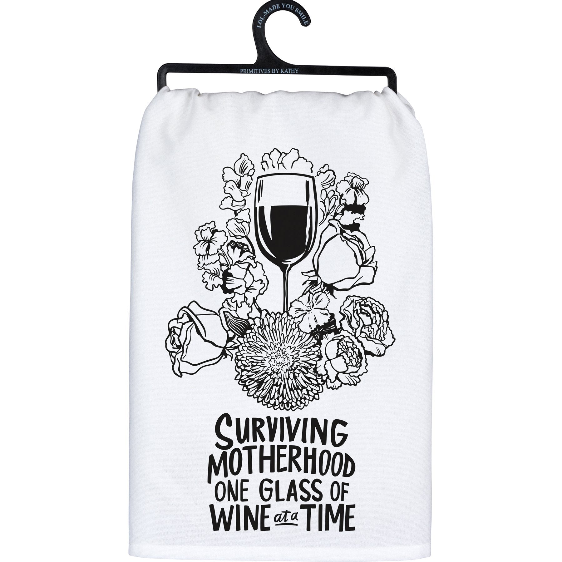 White towel with black floral design and text on a hanger