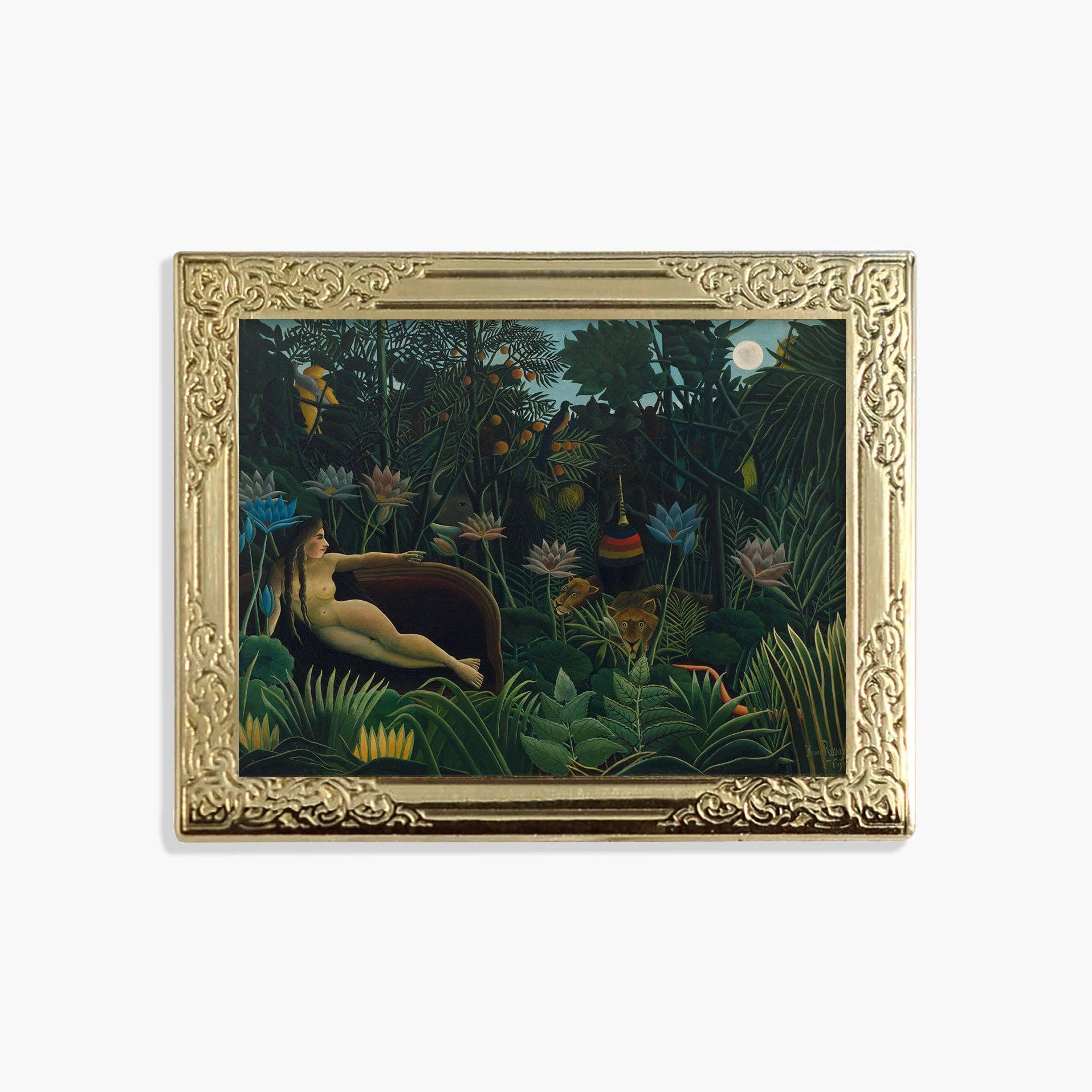 Lapel pin of a framed art print featuring a lush jungle scene with a reclining nude figure, surrounded by tropical foliage and flowers, enclosed in an ornate gold frame 