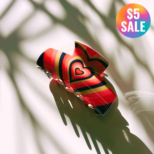 The Foxy in Warm ‘70s Sunrise Hair Claw | Hearts Claw Clip in Velvet Travel Bag