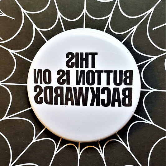 This Button is on Backwards Small Pinback Button | 1.25" Diameter