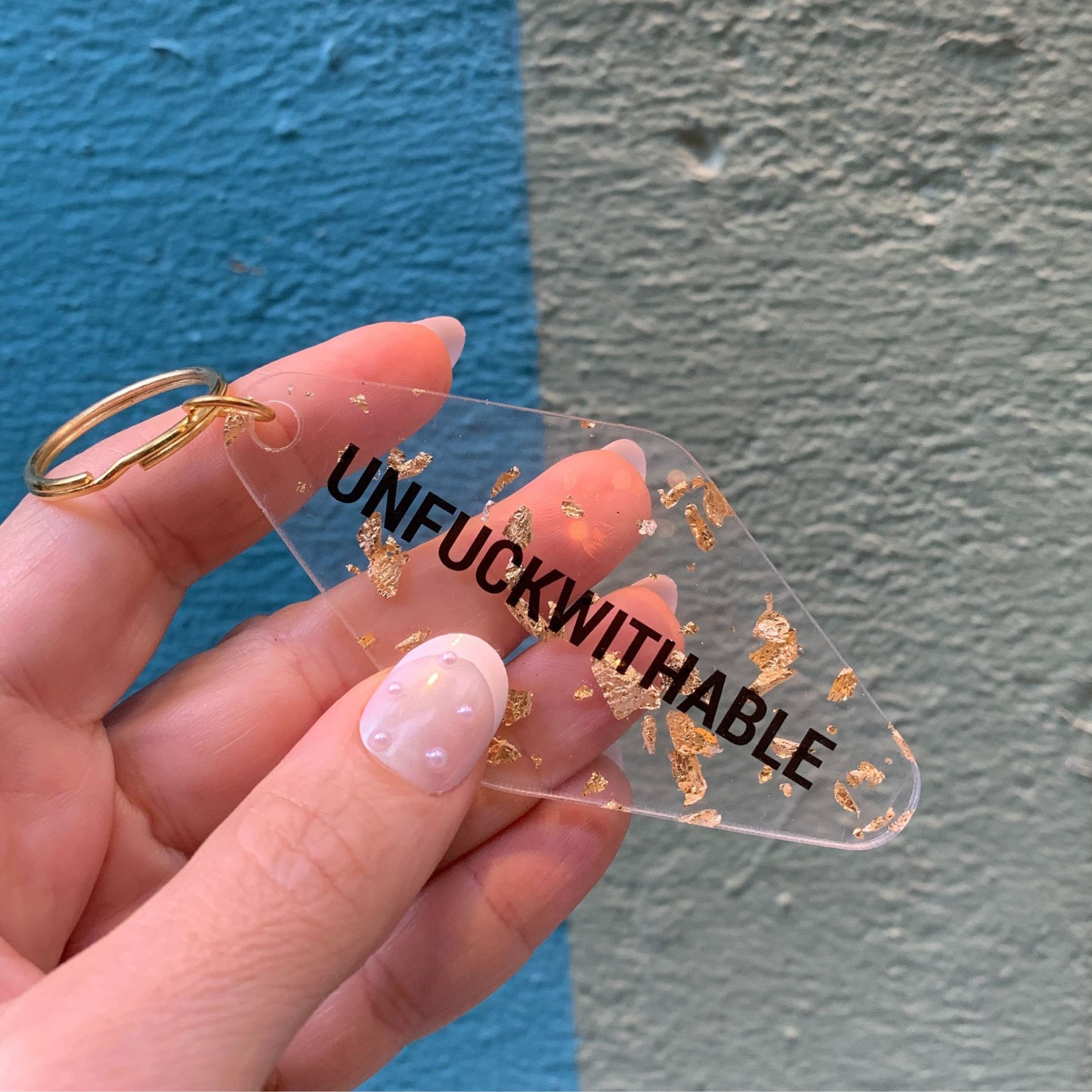 UNFUCKWITHABLE Motel Style Key Tag Keychain in Clear with Gold Leaf