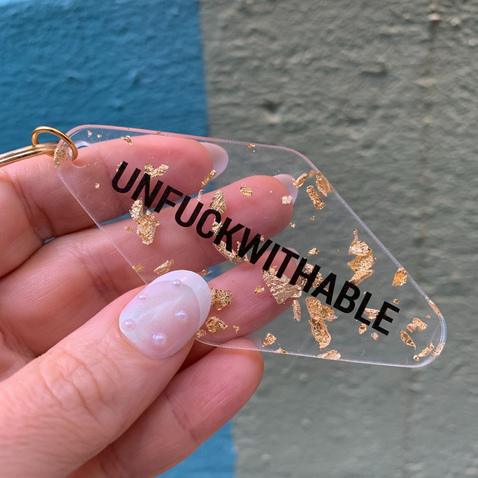 UNFUCKWITHABLE Motel Style Key Tag Keychain in Clear with Gold Leaf