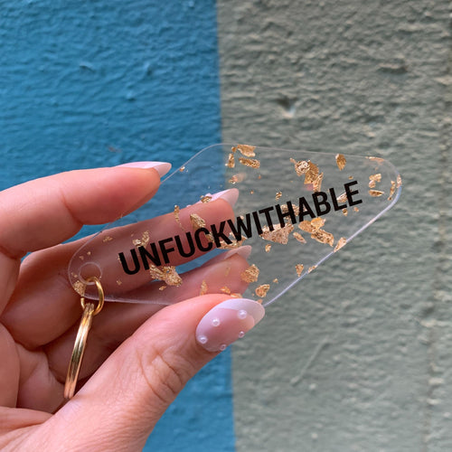 UNFUCKWITHABLE Motel Style Key Tag Keychain in Clear with Gold Leaf