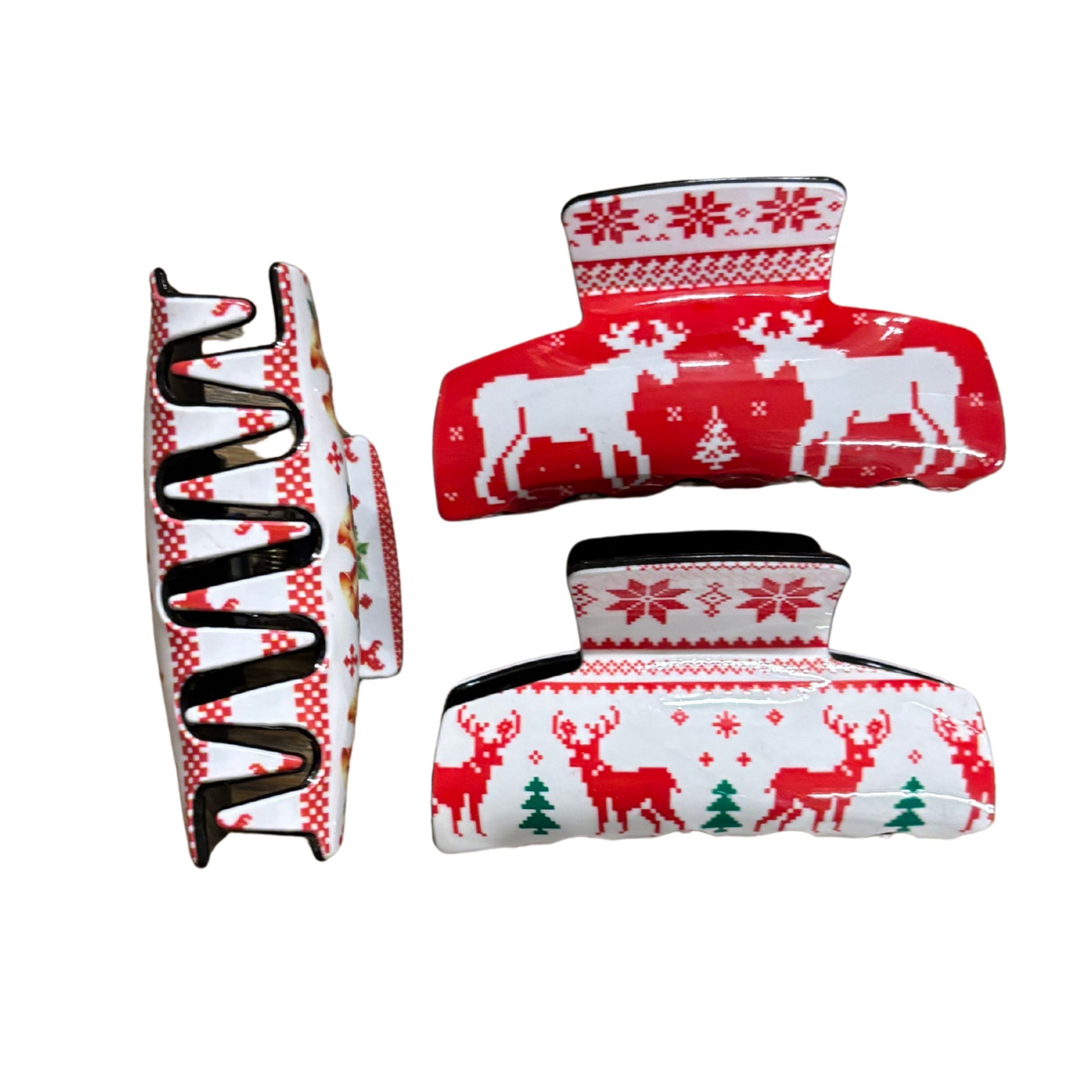 Set of three hair clips with Christmas-themed designs on a white background