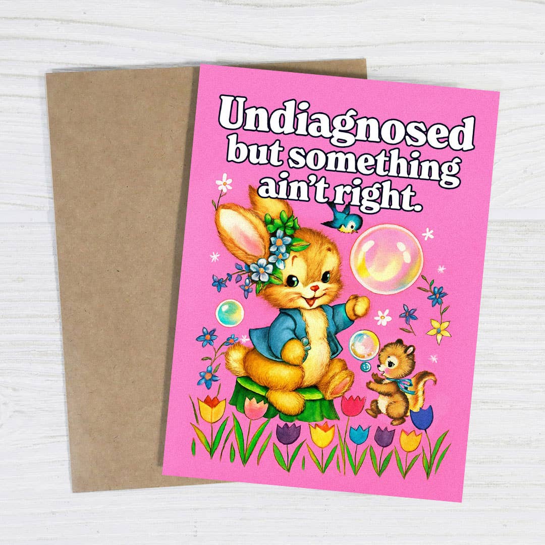 Greeting card with a rabbit illustration and text on a pink background