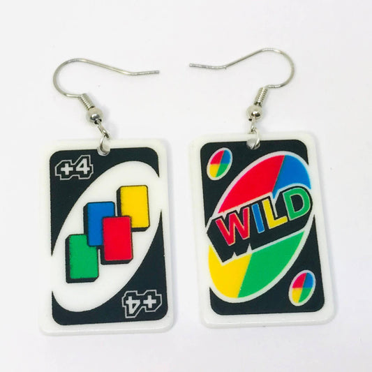 Pair of earrings designed like card game pieces on a white background