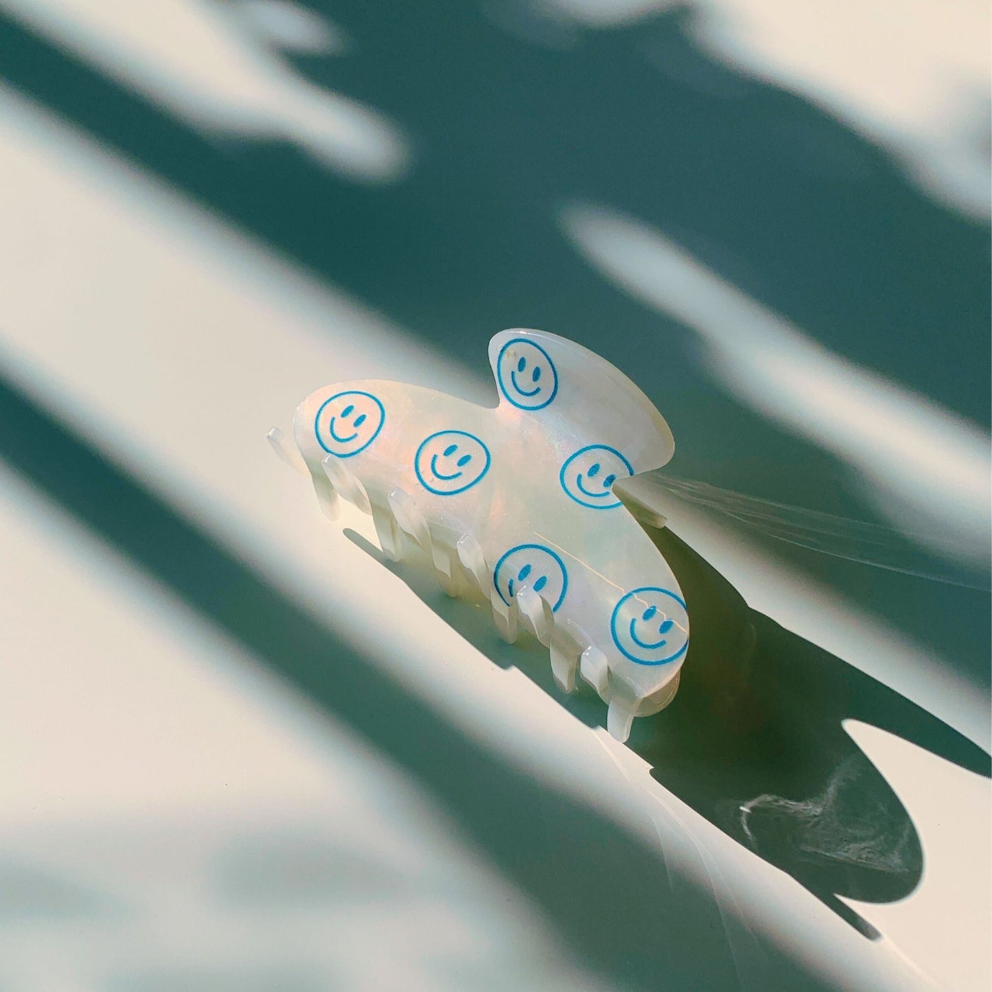 Velvet Claws 90s Hair Clip | Blue Joyful Emoji Face | Claw Clip in Velvet Travel Bag