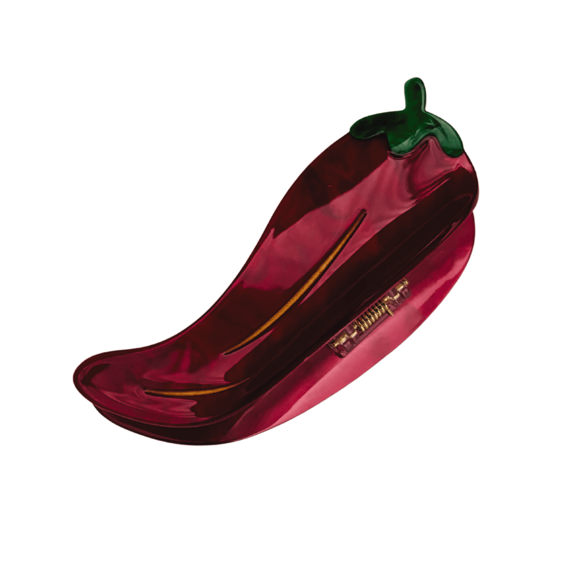 Red pepper-shaped hair clip on a white background