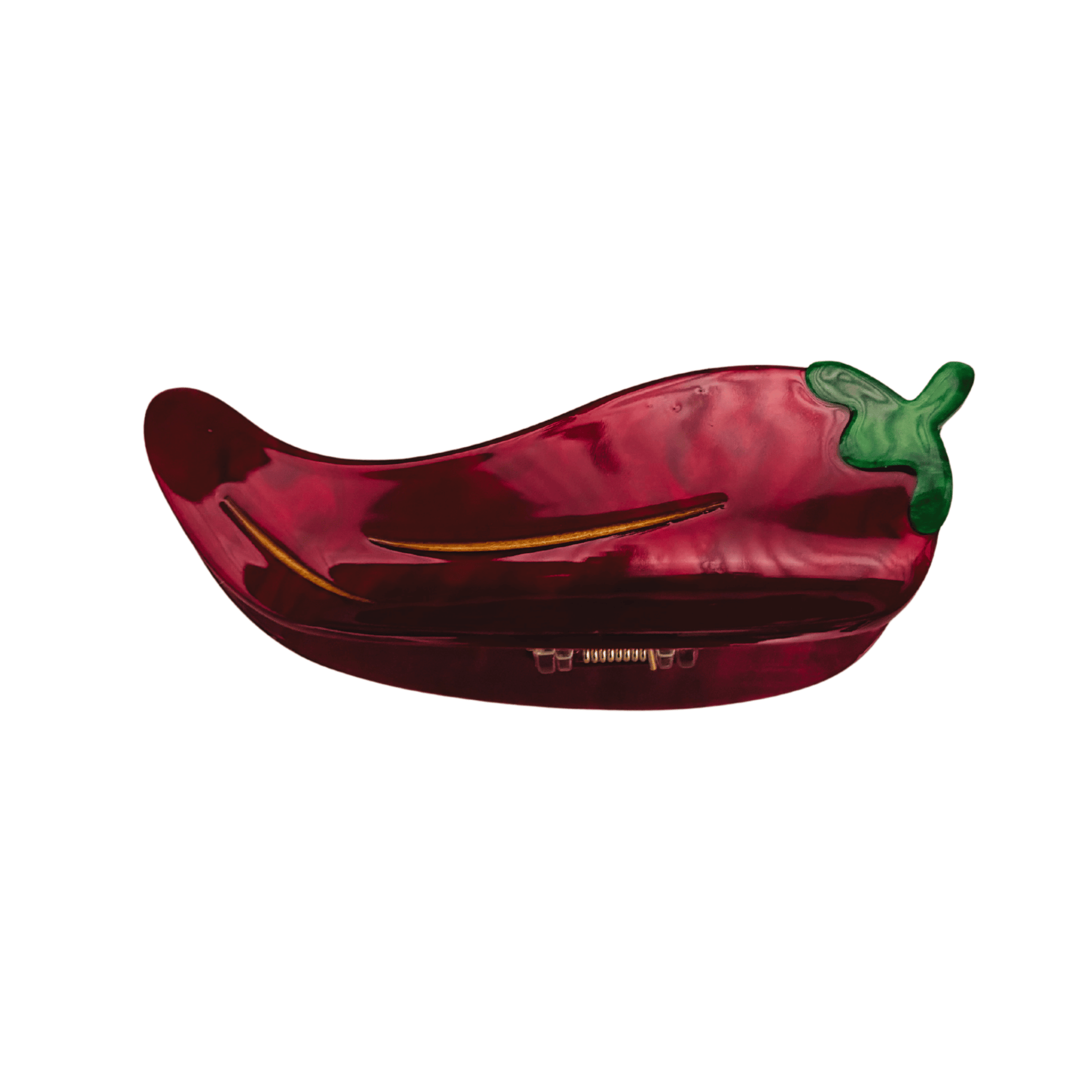 Red pepper-shaped hair crocodile on a white background