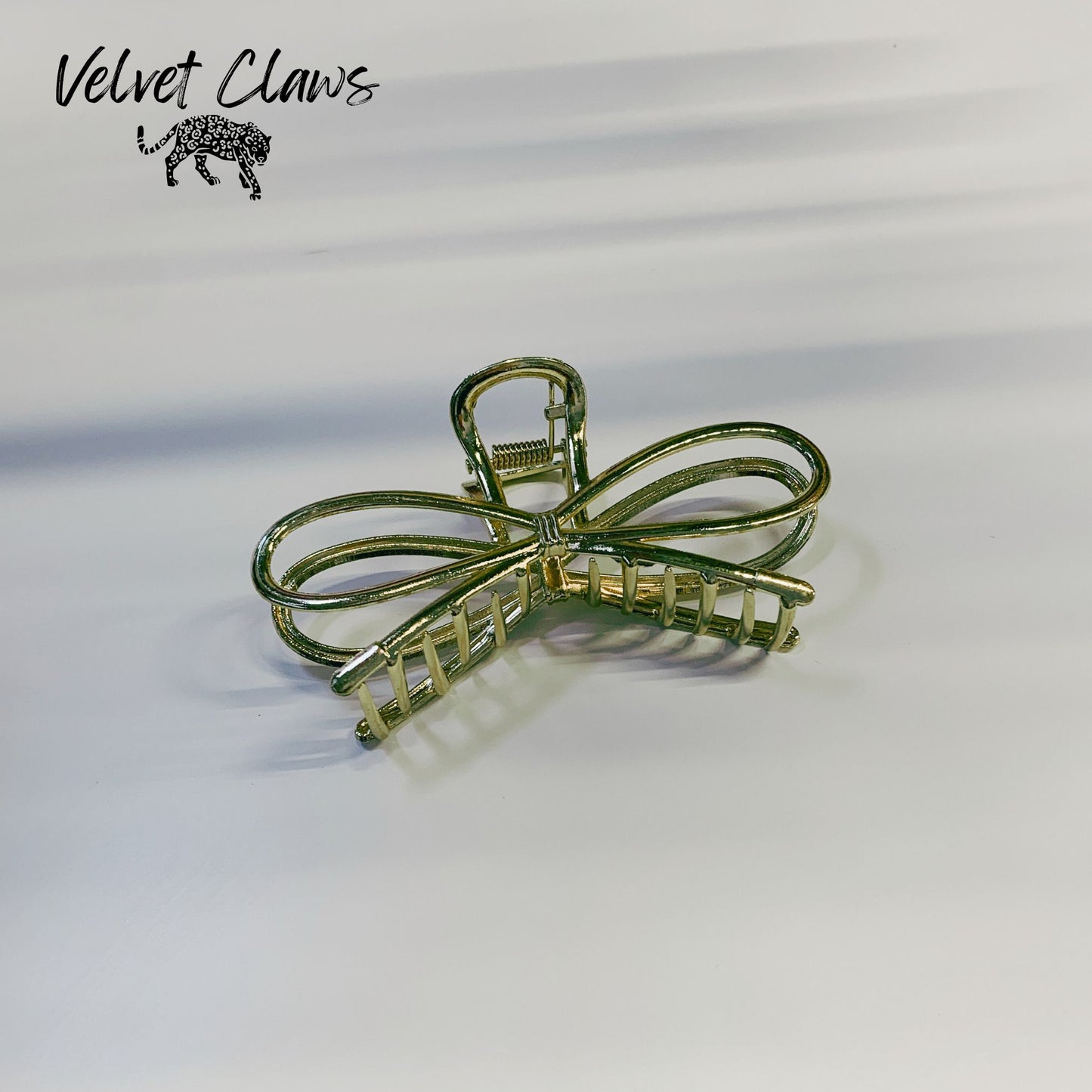 Velvet Claws Gold Metal Bow Hair Claw | Claw Clip in Velvet Travel Bag