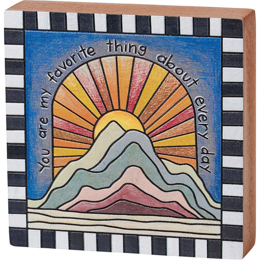 Decorative box with mountain and sun design and text 'You are my favorite thing about every day' 