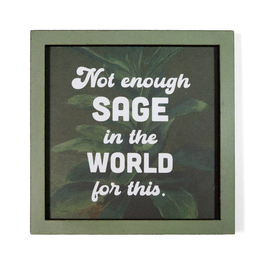 A square framed magnet with a muted green frame and a dark background featuring green leaves. White text reads, 'Not enough SAGE in the WORLD for this.