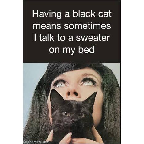 Woman holding a black cat with text "Having a black cat means sometimes I talk to a sweater on my bed".