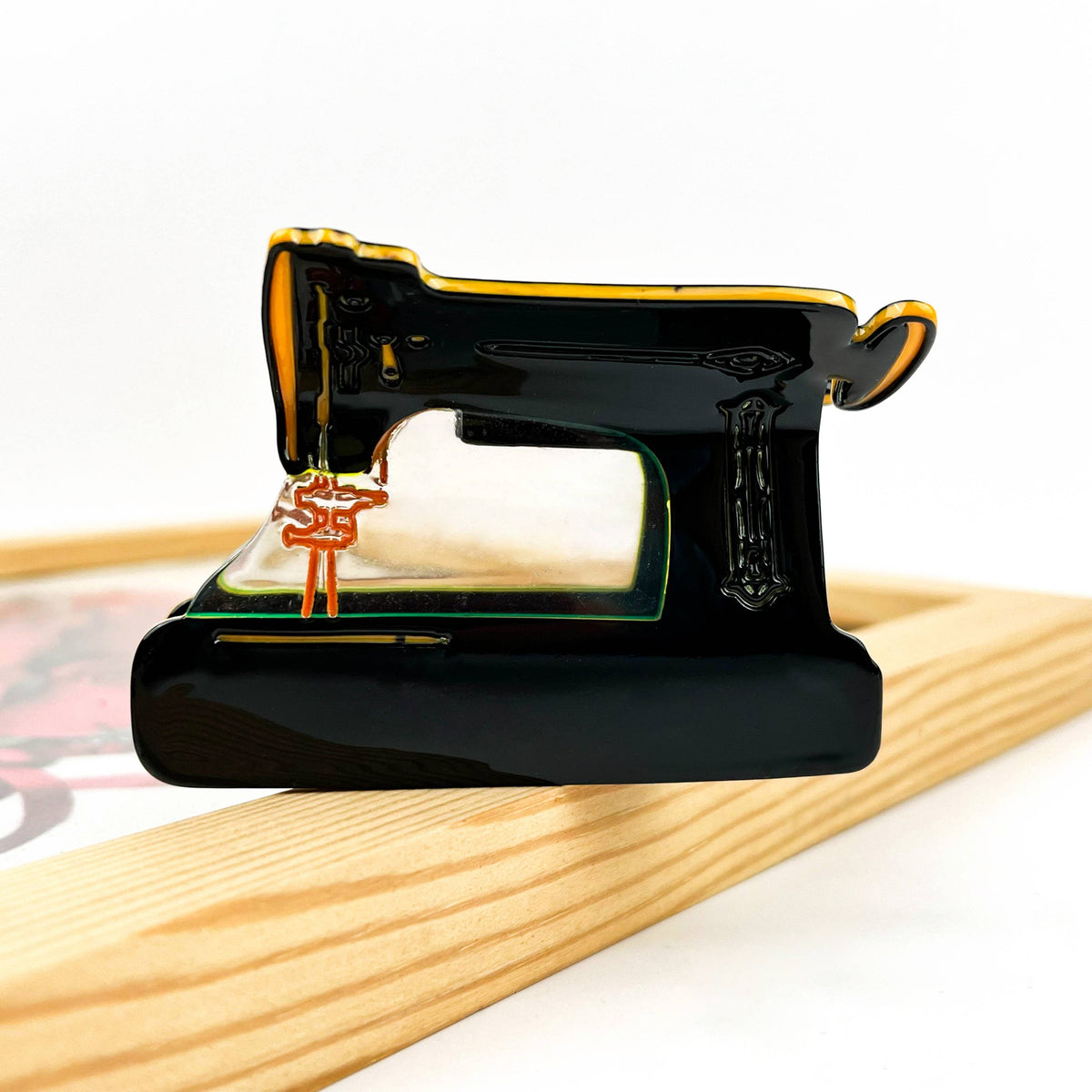 Black and gold sewing machine hair claw