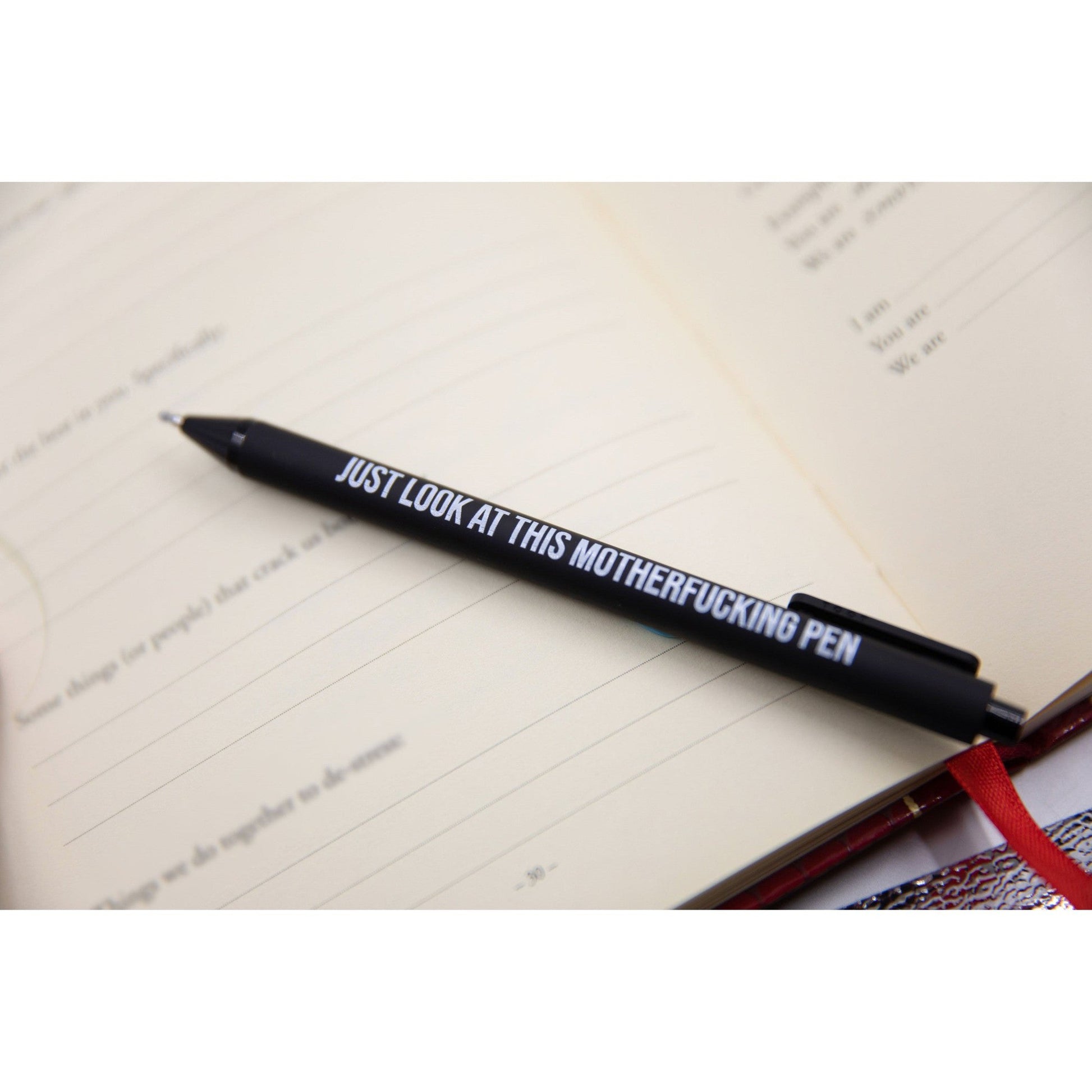 https://shop.getbullish.com/cdn/shop/products/Sweary-Fuck-Pens-Cussing-Pen-Gift-Set-5-Black-Gel-Pens-Rife-with-Profanity-5.jpg?v=1679686796&width=1946